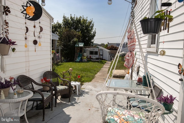 view of patio with a playground