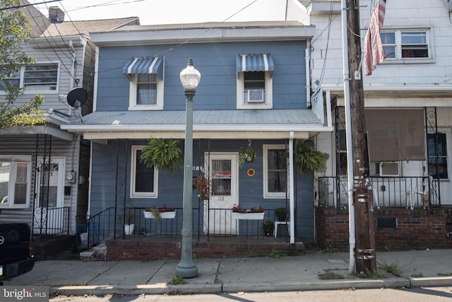 multi unit property featuring covered porch