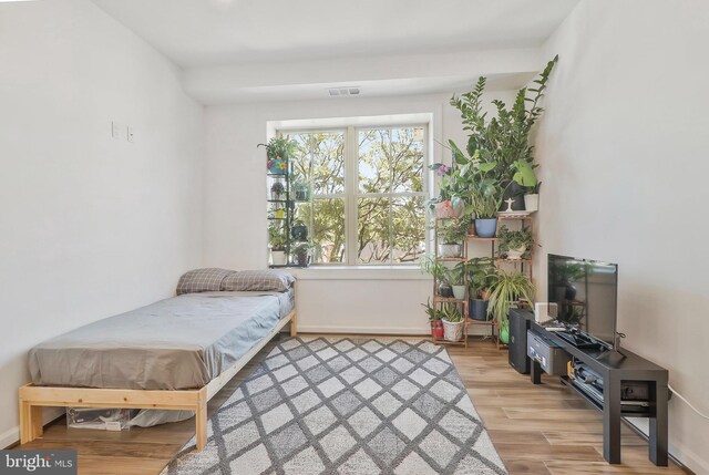 bedroom with light wood-type flooring