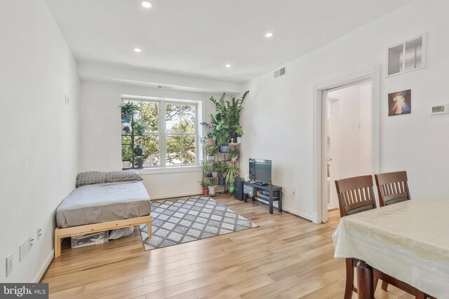 bedroom featuring light hardwood / wood-style flooring