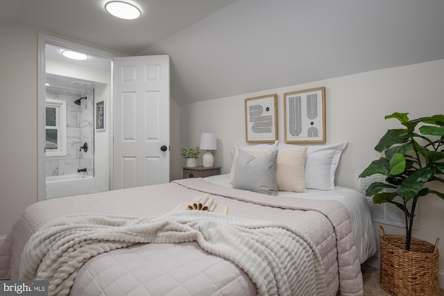 bedroom featuring vaulted ceiling