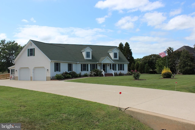 cape cod home with a front yard and a garage