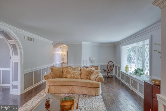 living room featuring ornamental molding and dark hardwood / wood-style floors