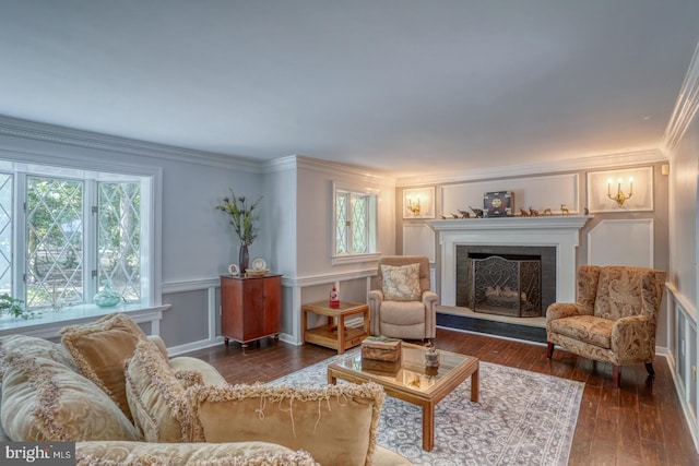 living room featuring dark hardwood / wood-style floors and crown molding