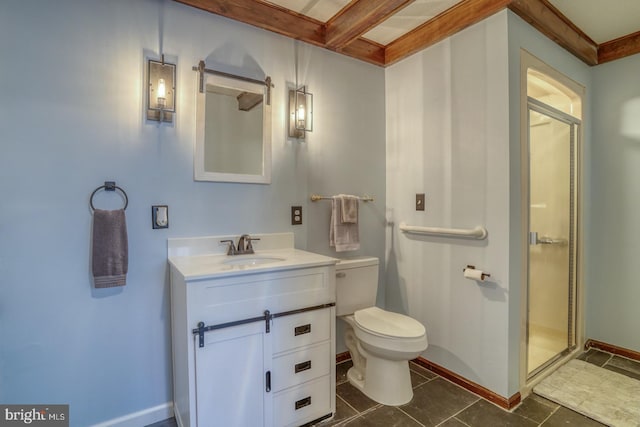 bathroom with toilet, a shower with door, and vanity