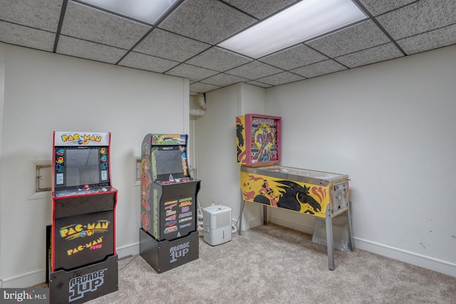 rec room with carpet flooring and a drop ceiling