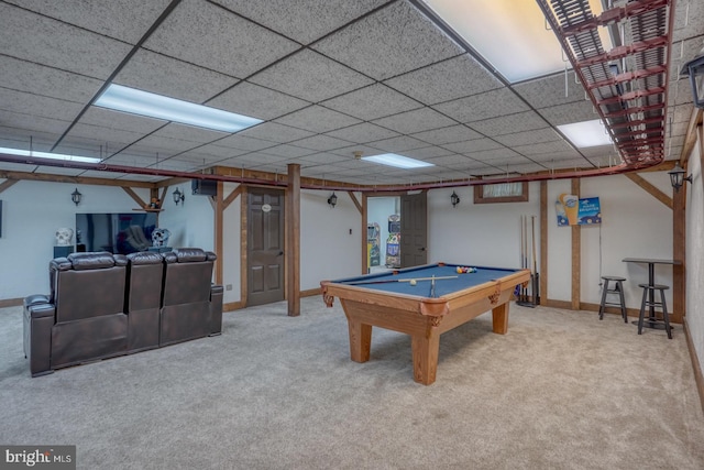 rec room with a paneled ceiling, billiards, and light colored carpet