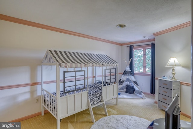 carpeted bedroom featuring a textured ceiling and ornamental molding