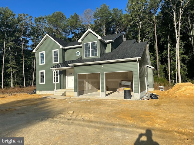 view of front of home with a garage