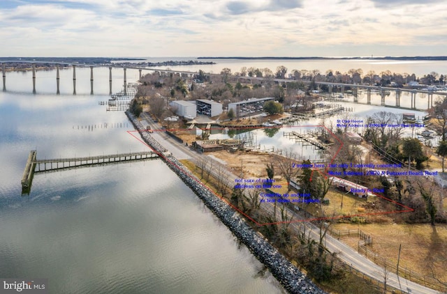 drone / aerial view with a water view