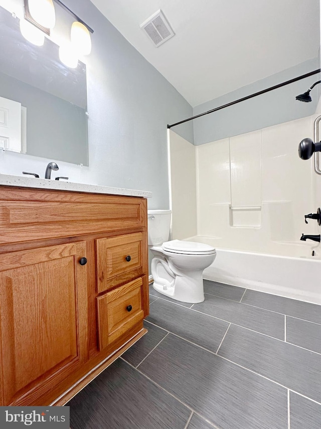 full bathroom with vanity, toilet, and tub / shower combination