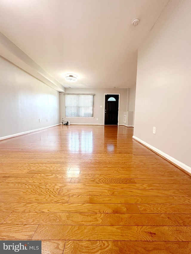 unfurnished living room with light hardwood / wood-style floors