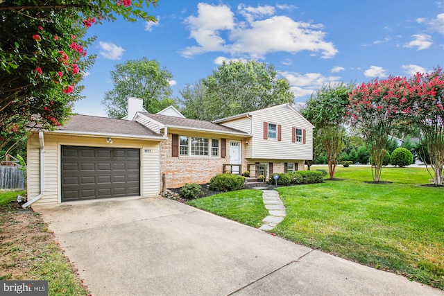 tri-level home with a front lawn and a garage