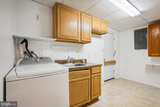 clothes washing area with electric panel, washer / clothes dryer, cabinets, and sink