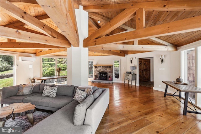 living room featuring a fireplace, a wall mounted air conditioner, wood ceiling, lofted ceiling with beams, and hardwood / wood-style flooring