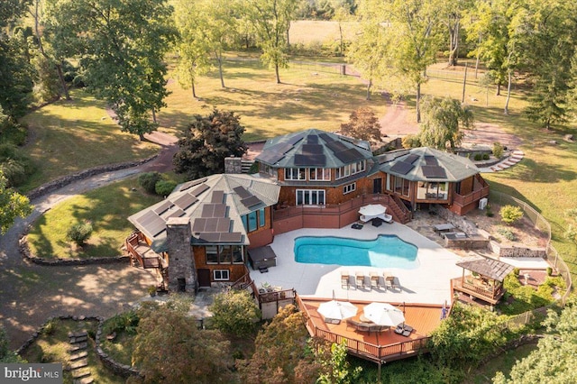 view of swimming pool with a deck