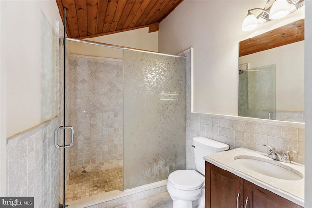 bathroom with vanity, a shower with shower door, wooden ceiling, tile walls, and toilet