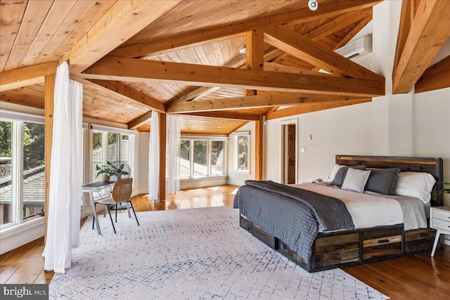 bedroom with light wood-type flooring, vaulted ceiling with beams, and wooden ceiling