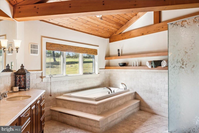 bathroom with tile patterned flooring, lofted ceiling with beams, wood ceiling, a bathtub, and vanity