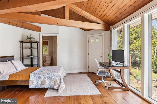 bedroom featuring connected bathroom, wooden ceiling, wood-type flooring, and vaulted ceiling with beams