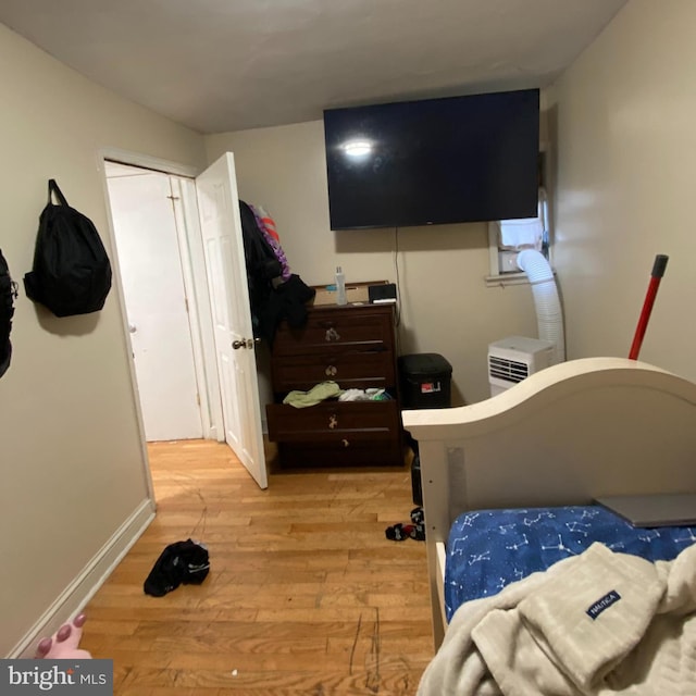 bedroom with light hardwood / wood-style flooring