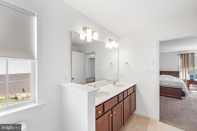 bathroom with vanity and tile patterned floors