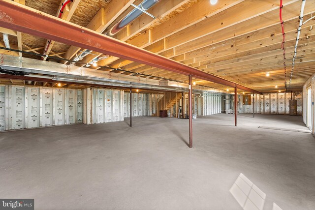 basement featuring water heater