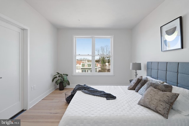 bedroom featuring light hardwood / wood-style floors