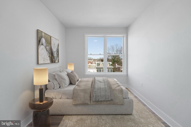 bedroom featuring hardwood / wood-style flooring