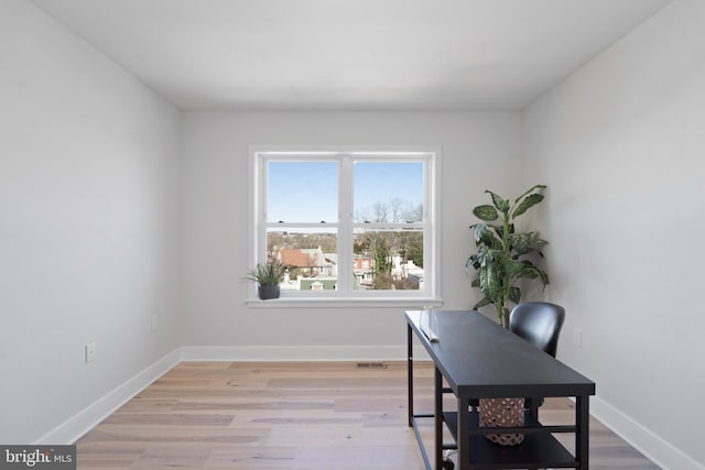 office space featuring light hardwood / wood-style flooring