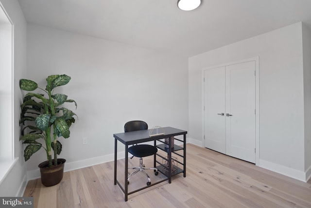 office area with light wood-type flooring