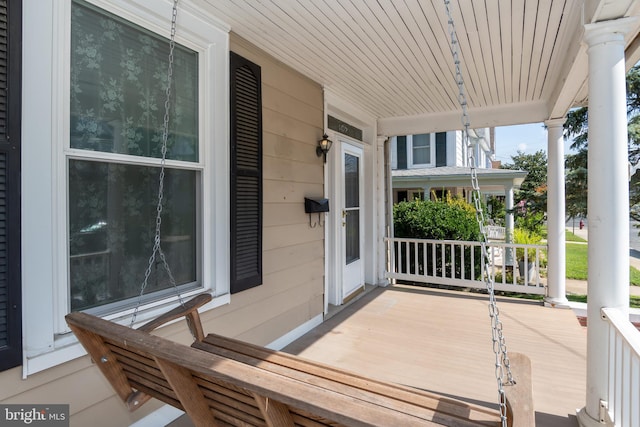 view of patio featuring a porch