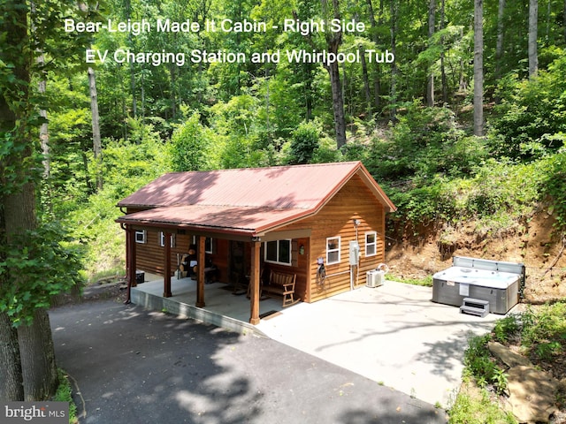 view of log cabin