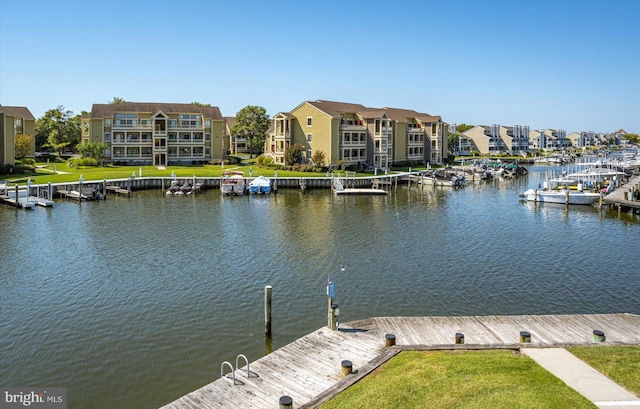 dock area featuring a water view