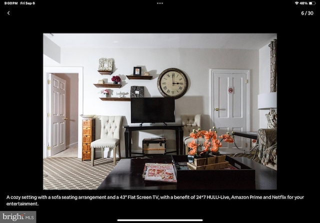 living room featuring carpet flooring