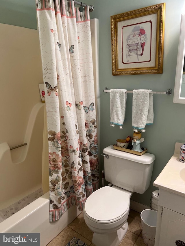 full bathroom with shower / bath combo, tile patterned flooring, toilet, and vanity