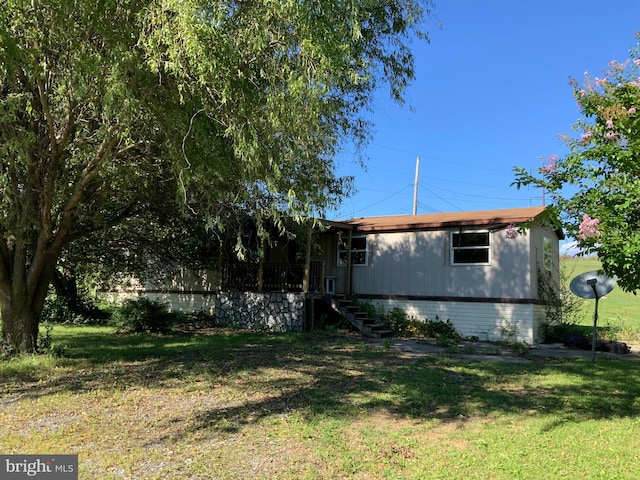 exterior space with a front yard