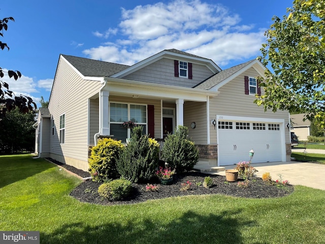 view of front facade featuring a garage, concrete driveway, a front lawn, and a shingled roof