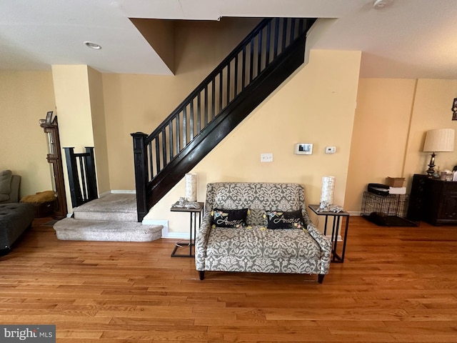 living area with light hardwood / wood-style flooring