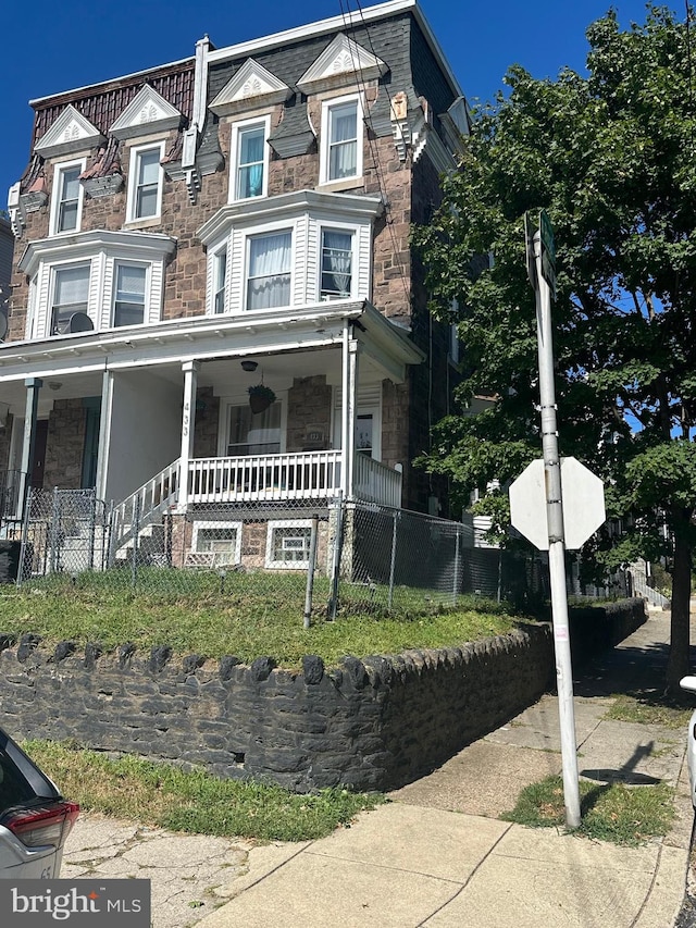 multi unit property featuring covered porch