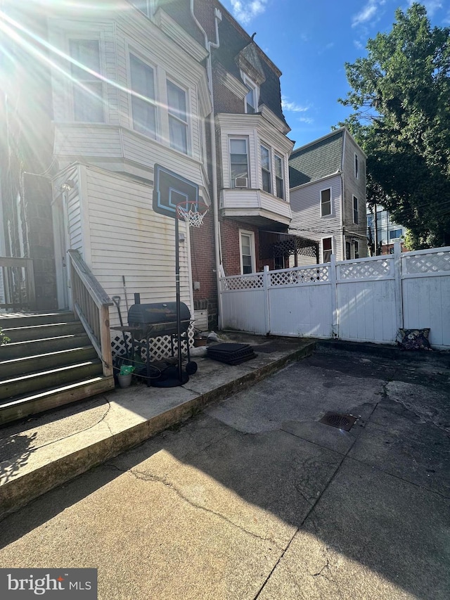 back of property with a patio area