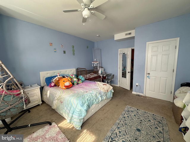 bedroom featuring ceiling fan and carpet floors