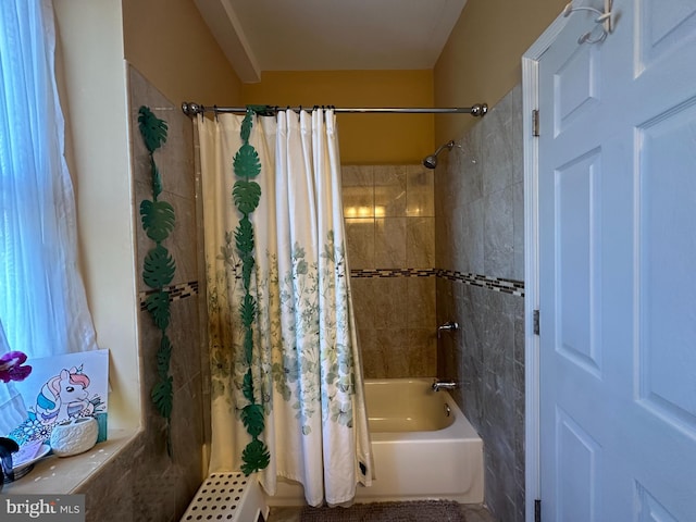 bathroom featuring shower / tub combo