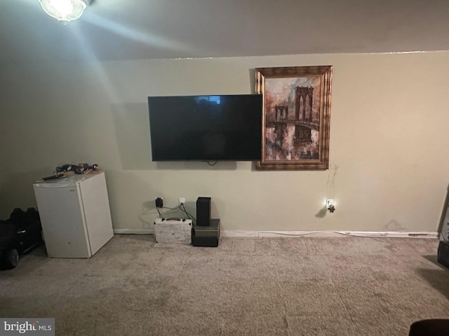 unfurnished living room with carpet floors