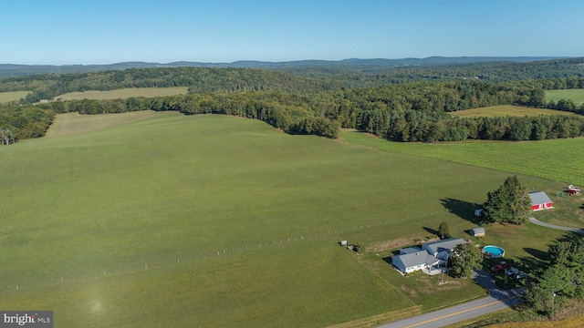 birds eye view of property featuring a rural view