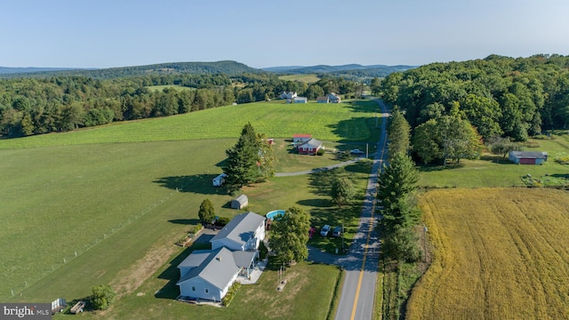 birds eye view of property featuring a rural view