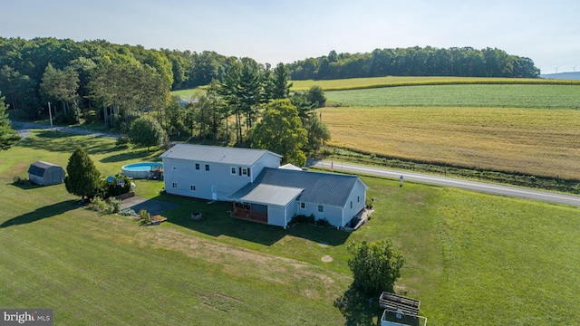 birds eye view of property featuring a rural view