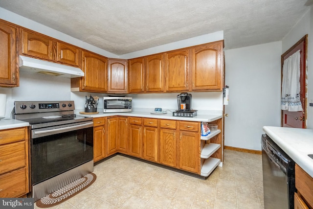 kitchen featuring a textured ceiling and appliances with stainless steel finishes