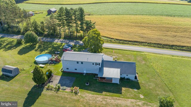 back of house with a yard