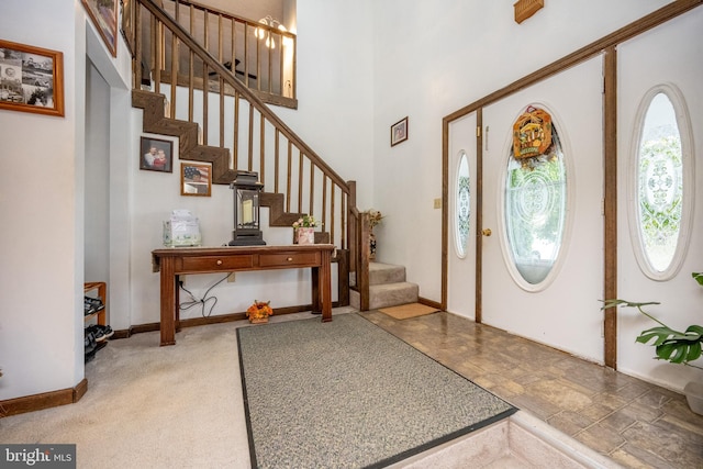 foyer featuring a high ceiling